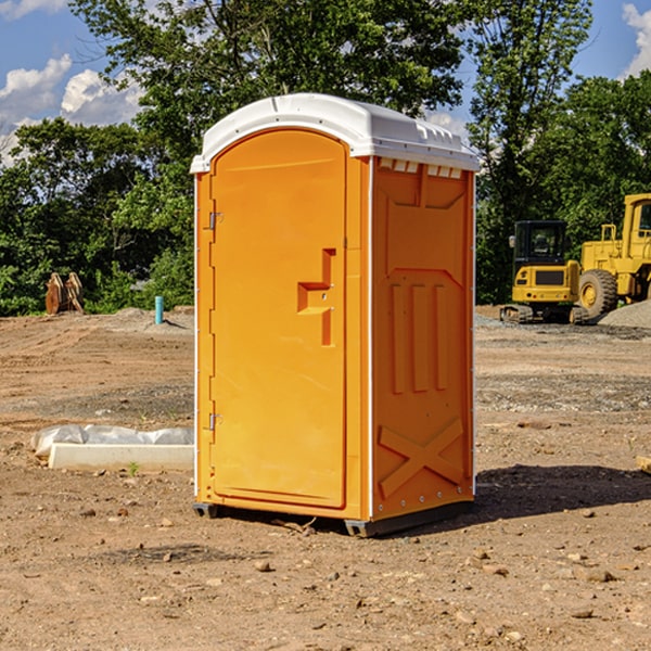 how often are the portable restrooms cleaned and serviced during a rental period in Earlham